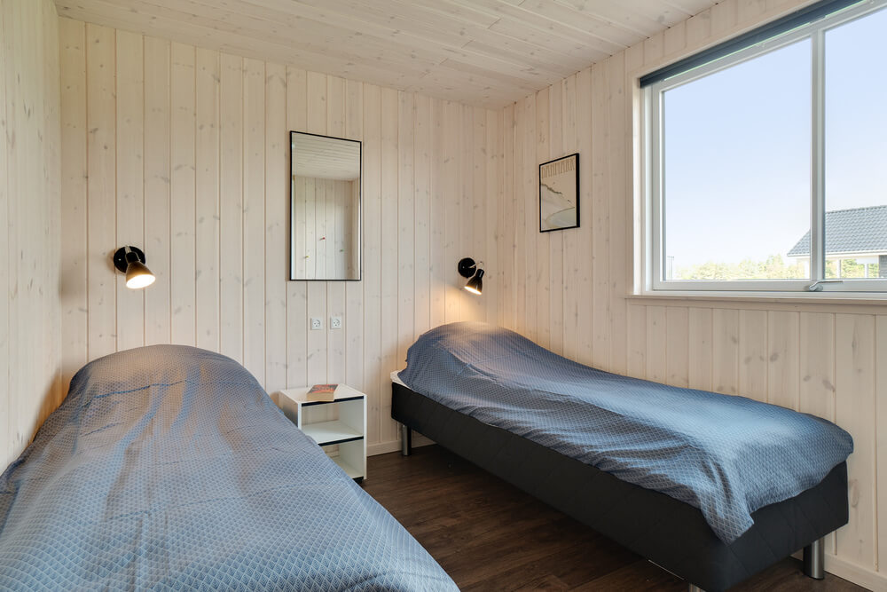 Eines der 12 Schlafzimmer im Luxusferienhaus Nr. 454