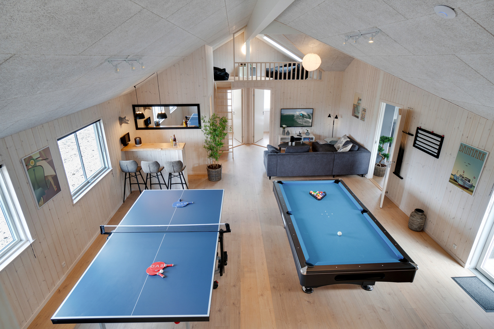 Das Luxusferienhaus 457 für 20 Personen hat einen großen Aktivitätsraum mit u. a. Billard und Darts