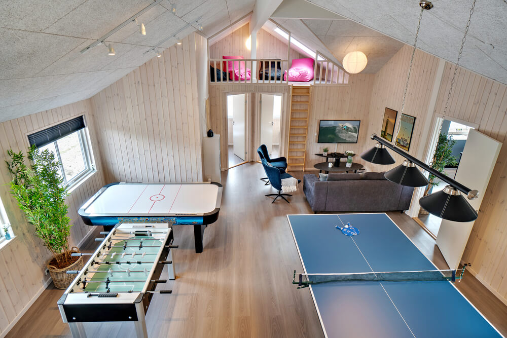 Das Luxusferienhaus 463 für 20 Personen hat einen großen Aktivitätsraum mit u. a. Billard und Darts