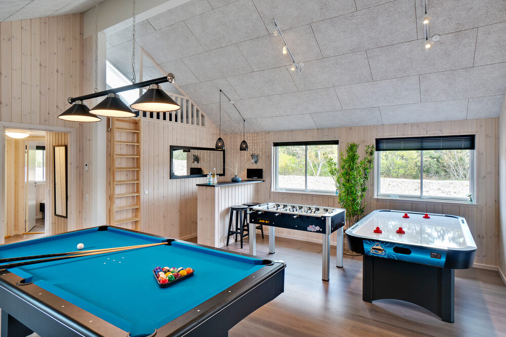 Neben den vielen schönen Stunden, die man im Poolbereich des Hauses verbringen kann, bietet das Luxusferienhaus 463 auch Spielevergnügen bei Billard/Tischtennis und Darts