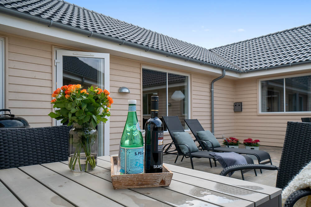 Genießen Sie einen Grillabend auf der Terrasse des Luxusferienhauses Nr. 463 in Westjütland