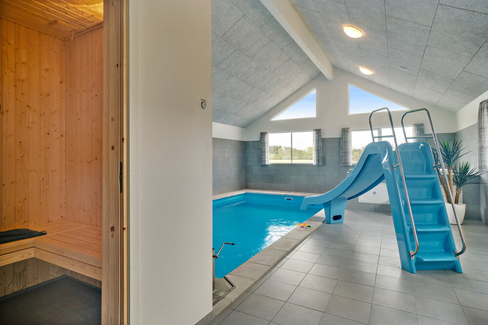 Genießen Sie die heiße Sauna im Luxusferienhaus Nr. 463 für 20 Personen