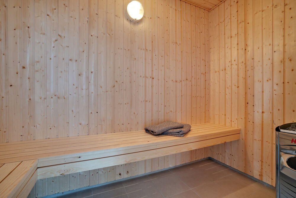 Genießen Sie die heiße Sauna im Luxusferienhaus Nr. 467 für 30 Personen