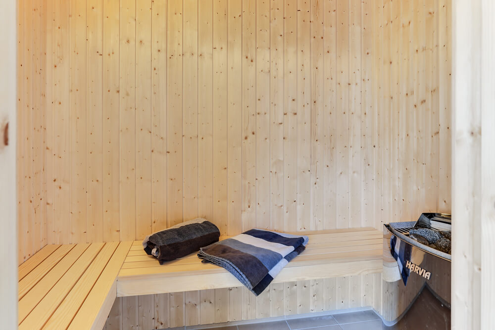 Genießen Sie die heiße Sauna im Luxusferienhaus Nr. 447 für 24 Personen