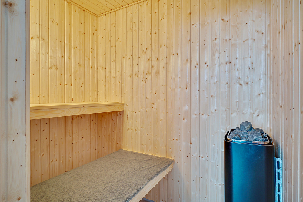 Genießen Sie die heiße Sauna im Luxusferienhaus Nr. 472 für 18 Personen