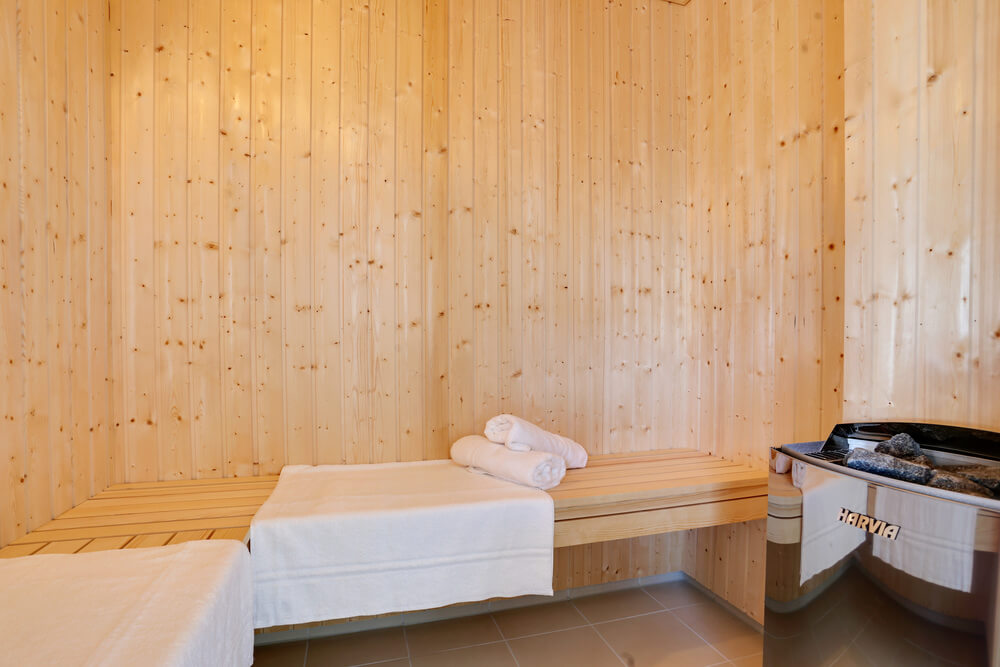 Genießen Sie die heiße Sauna im Luxusferienhaus Nr. 476 für 20 Personen