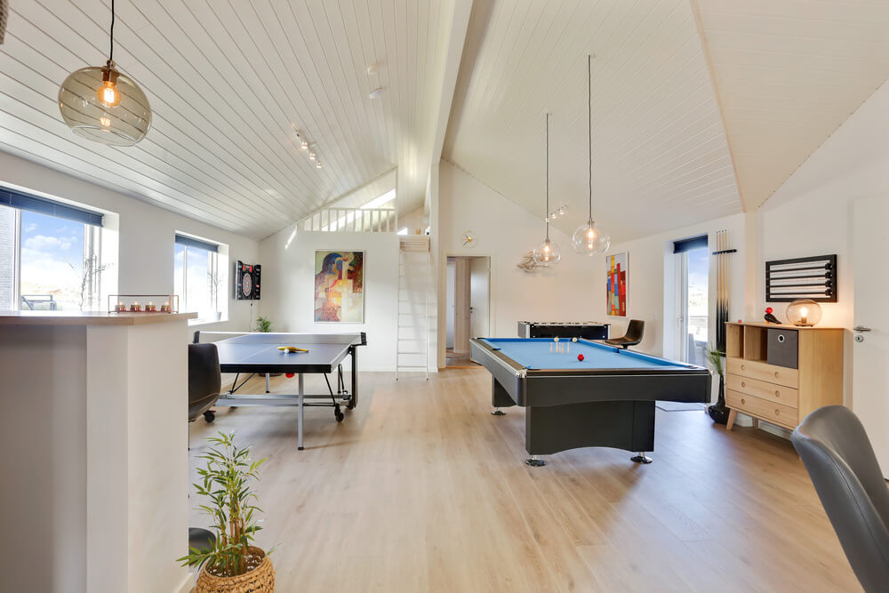 Das Luxusferienhaus 476 für 20 Personen hat einen großen Aktivitätsraum mit u. a. Billard und Darts