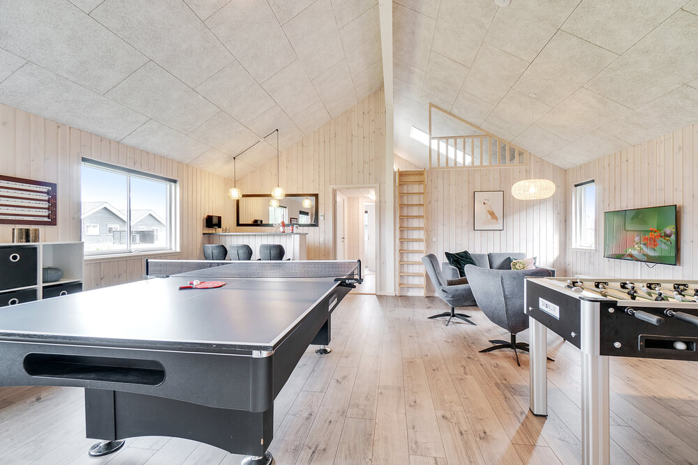 Das Luxusferienhaus 464 für 16 Personen hat einen großen Aktivitätsraum mit u. a. Billard und Darts