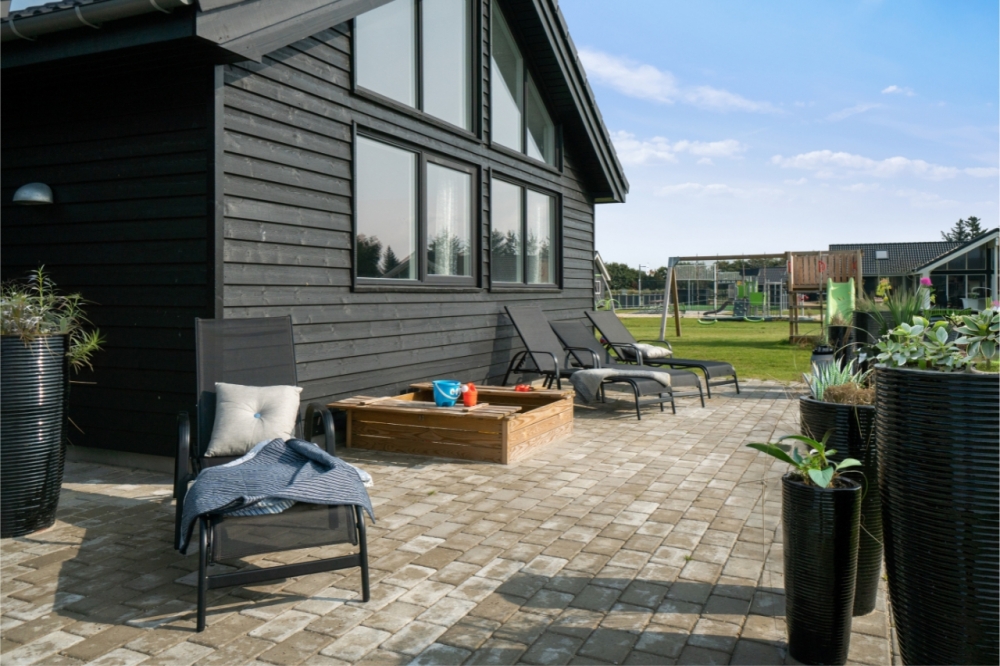 Das Luxusferienhaus Nr. 464 hat eine tolle Terrasse, die mit hochwertigen Gartenmöbeln für 16 Personen ausgestattet ist.