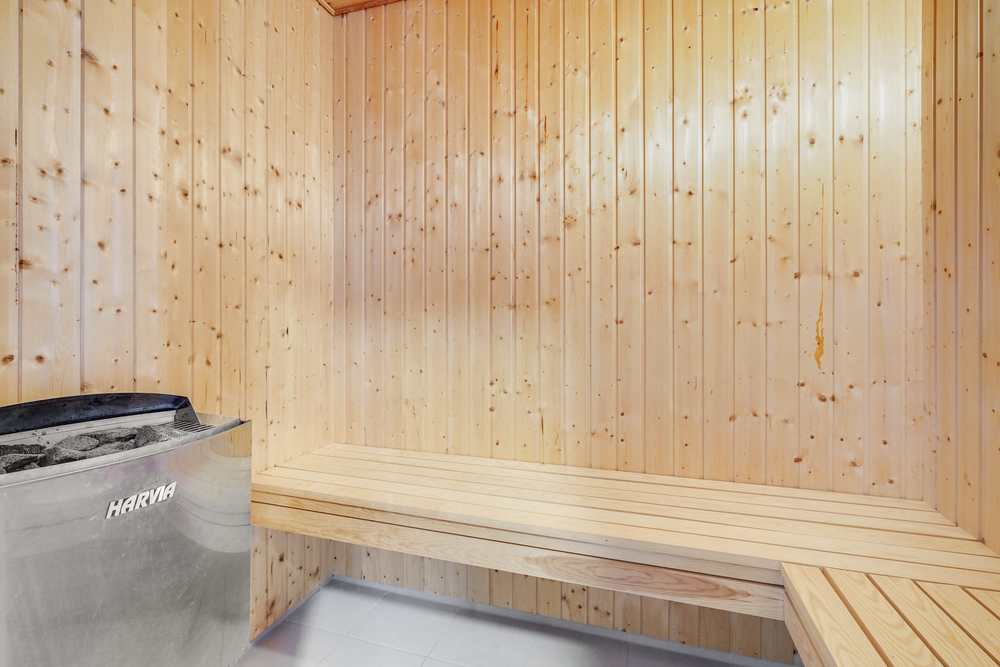 Genießen Sie die heiße Sauna im Luxusferienhaus Nr. 468 für 20 Personen
