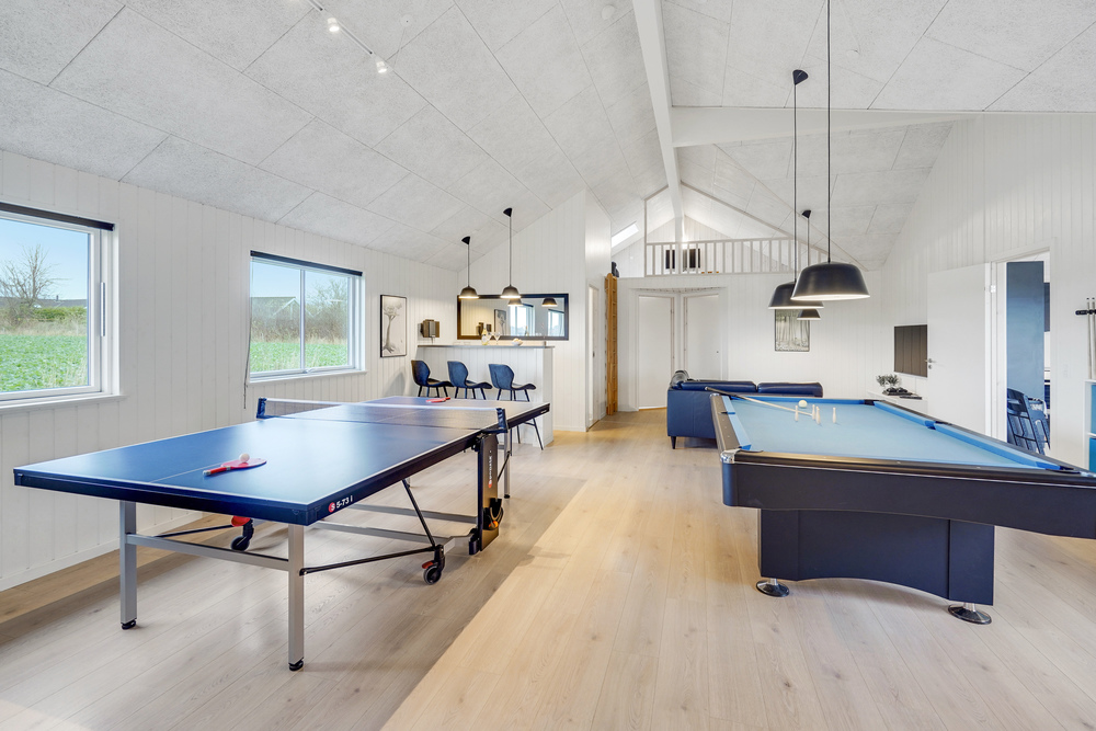Das Luxusferienhaus 468 für 20 Personen hat einen großen Aktivitätsraum mit u. a. Billard und Darts