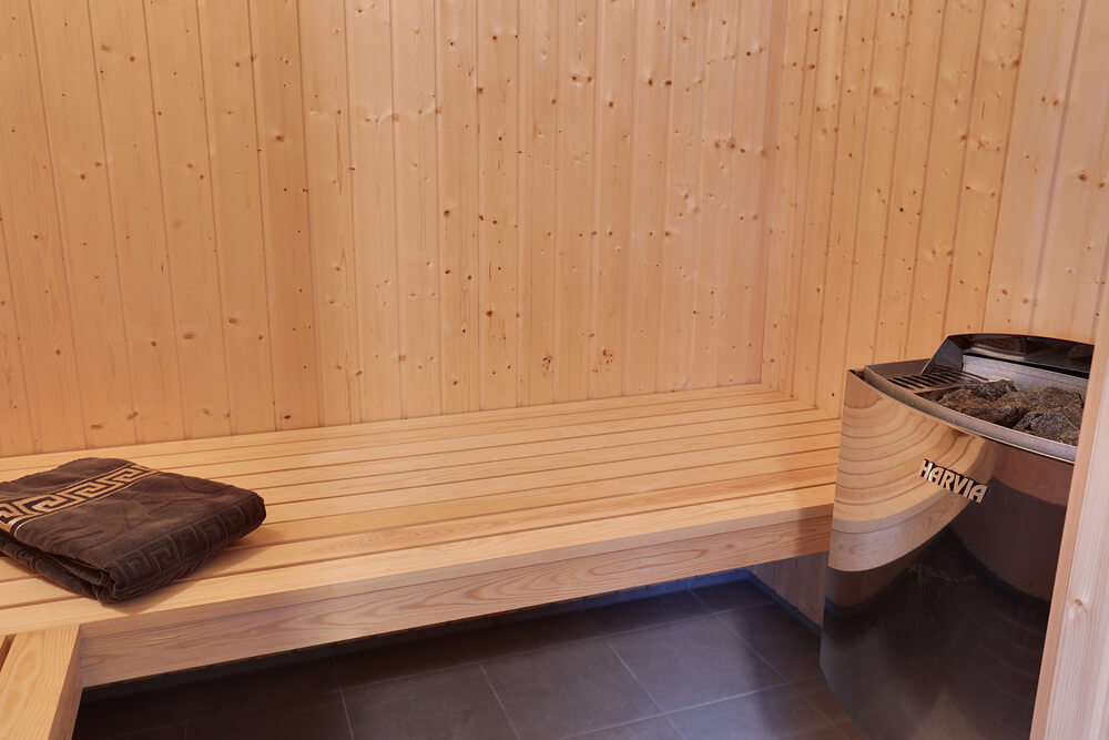 Genießen Sie die heiße Sauna im Luxusferienhaus Nr. 469 für 22 Personen