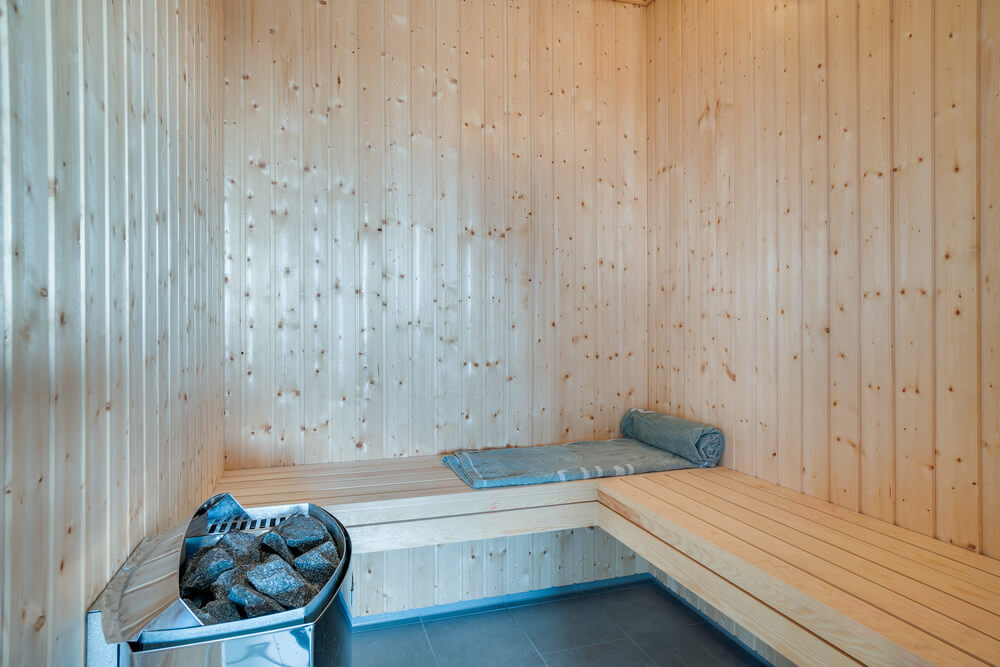 Genießen Sie die heiße Sauna im Luxusferienhaus Nr. 477 für 18 Personen