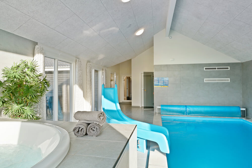 Genießen Sie den warmen Whirlpool im Luxusferienhaus Nr. 479 in Ostjütland