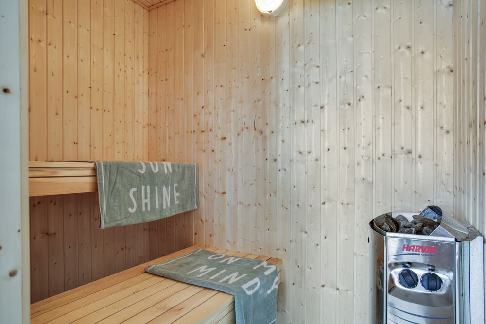 Genießen Sie die heiße Sauna im Luxusferienhaus Nr. 489 für 18 Personen