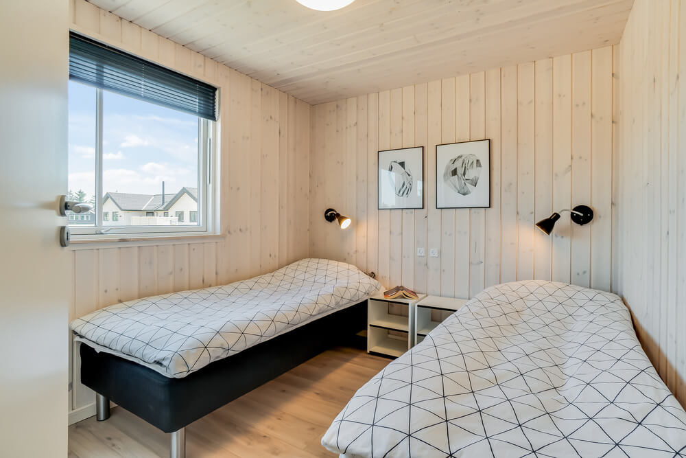 Eines der 7 Schlafzimmer im Luxusferienhaus Nr. 475