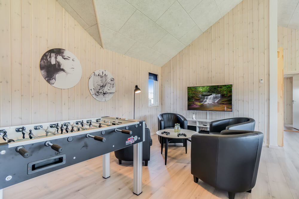 Aktivitätsraum im Luxusferienhaus Nr. 475 mit 7 Schlafzimmern und Platz für 18 Gäste.
