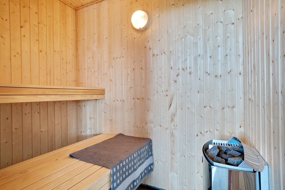 Genießen Sie die heiße Sauna im Luxusferienhaus Nr. 475 für 18 Personen