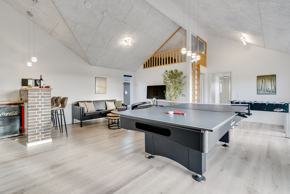 Neben den vielen schönen Stunden, die man im Poolbereich des Hauses verbringen kann, bietet das Luxusferienhaus 486 auch Spielevergnügen bei Billard/Tischtennis und Darts
