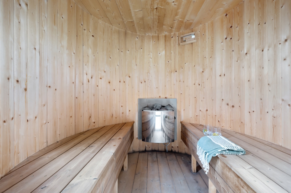Genießen Sie die heiße Sauna im Luxusferienhaus Nr. 486 für 20 Personen