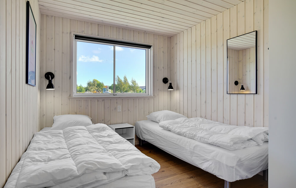 Eines der 7 Schlafzimmer im Luxusferienhaus Nr. 490