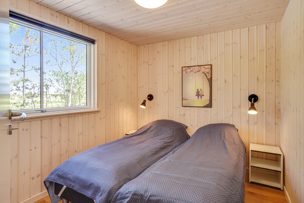 Eines der 7 Schlafzimmer im Luxusferienhaus Nr. 494