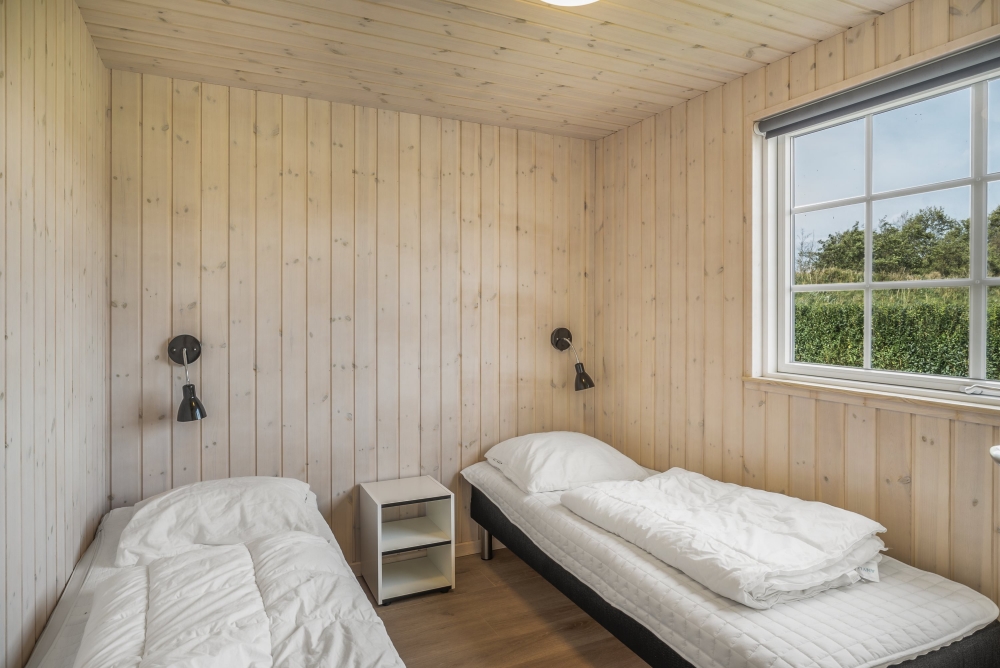 Eines der 10 Schlafzimmer im Luxusferienhaus Nr. 500