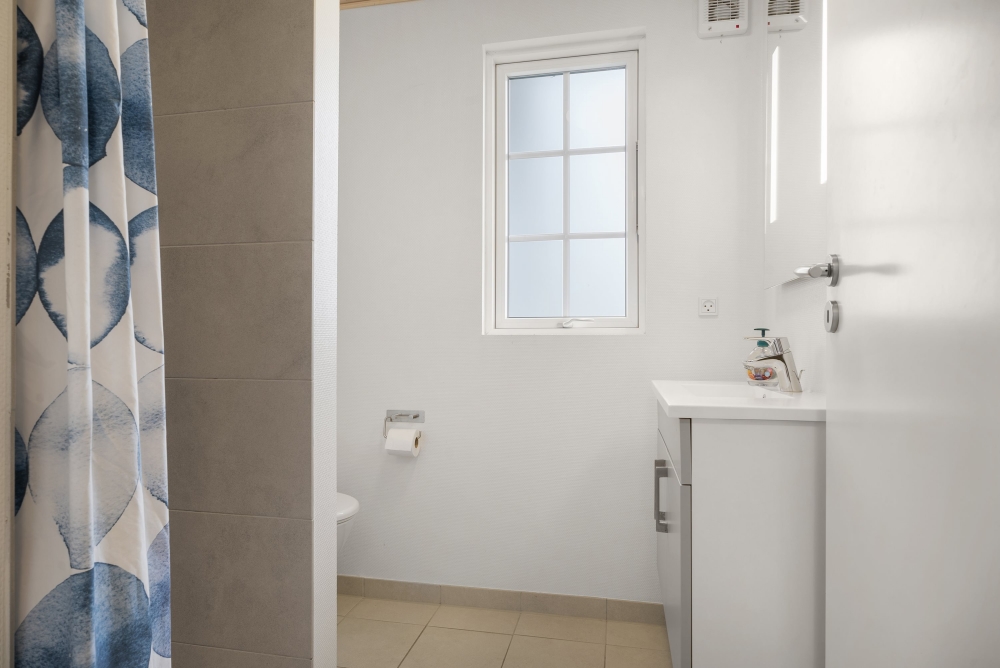 Eines der Badezimmer im Luxusferienhaus Nr. 500