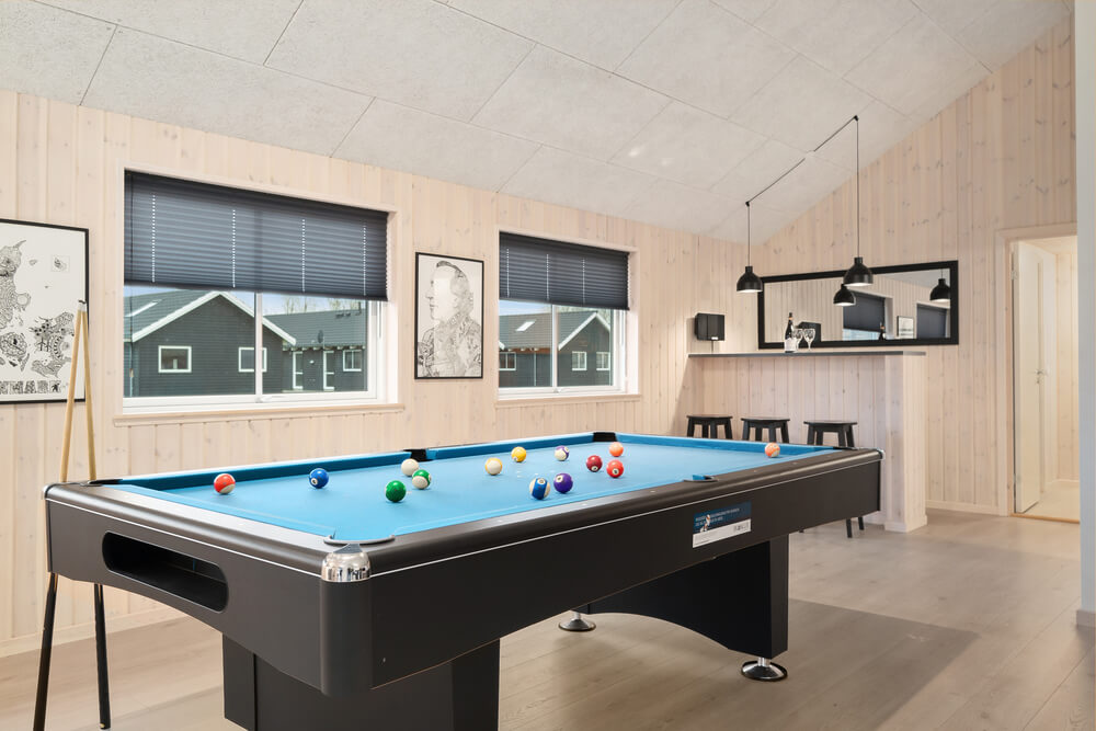 Neben den vielen schönen Stunden, die man im Poolbereich des Hauses verbringen kann, bietet das Luxusferienhaus 726 auch Spielevergnügen bei Billard/Tischtennis und Darts