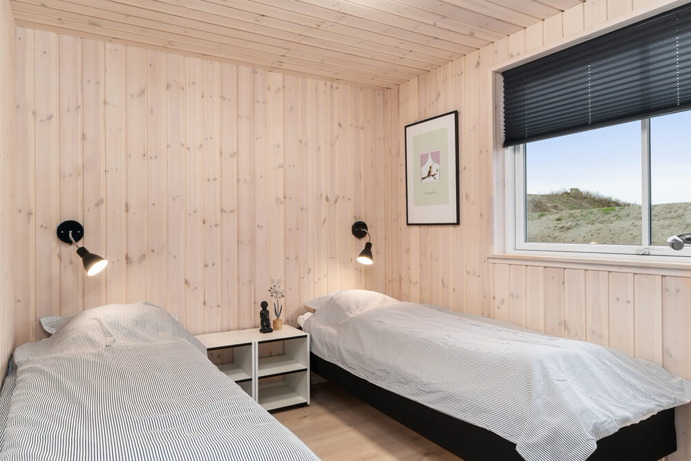 Eines der 9 Schlafzimmer im Luxusferienhaus Nr. 728