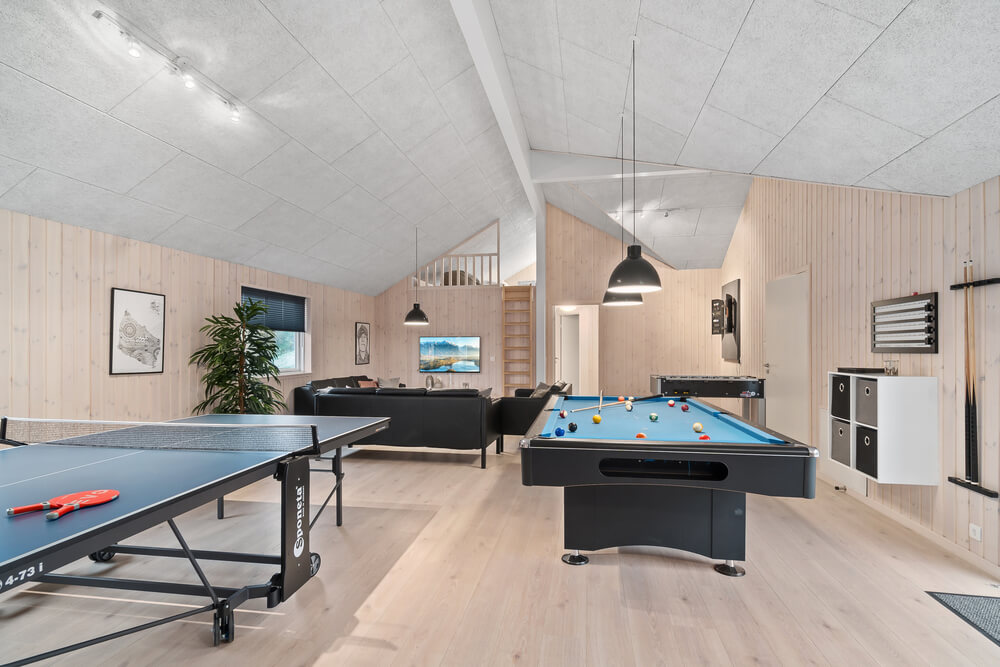 Neben den vielen schönen Stunden, die man im Poolbereich des Hauses verbringen kann, bietet das Luxusferienhaus 728 auch Spielevergnügen bei Billard/Tischtennis und Darts
