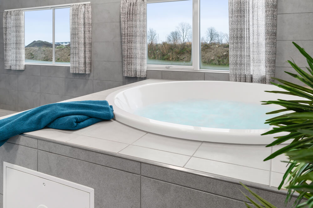 Genießen Sie den warmen Whirlpool im Luxusferienhaus Nr. 728 in Deutschland