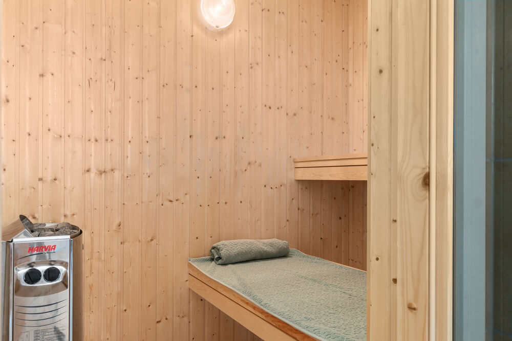Genießen Sie die heiße Sauna im Luxusferienhaus Nr. 733 für 18 Personen