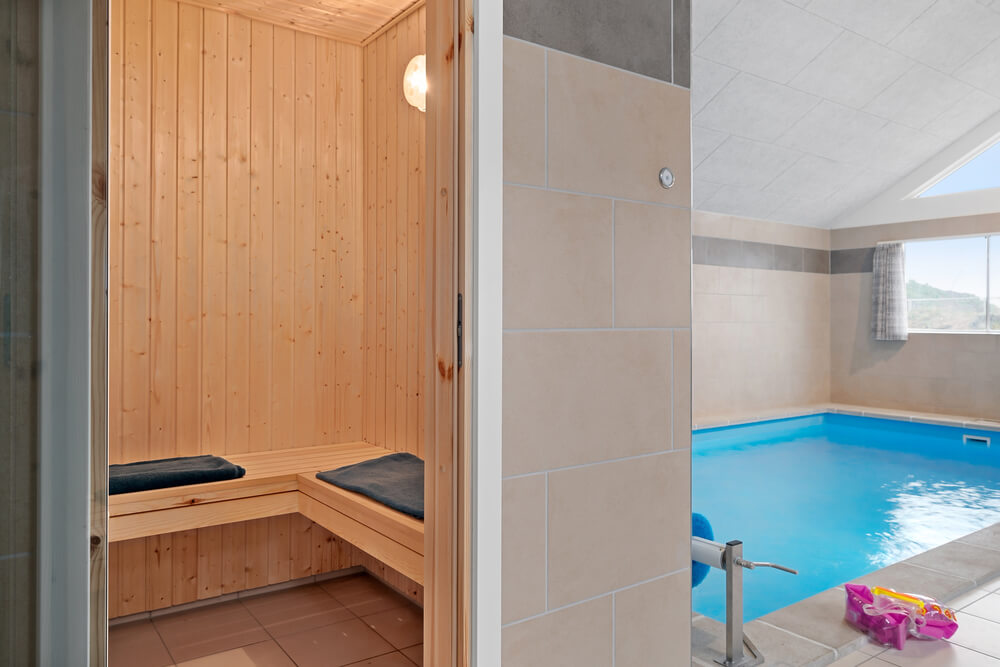 Genießen Sie die heiße Sauna im Luxusferienhaus Nr. 732 für 20 Personen