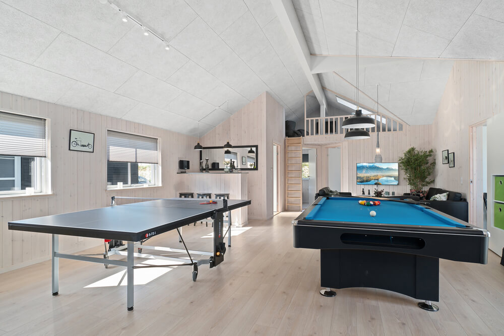 Neben den vielen schönen Stunden, die man im Poolbereich des Hauses verbringen kann, bietet das Luxusferienhaus 731 auch Spielevergnügen bei Billard/Tischtennis und Darts