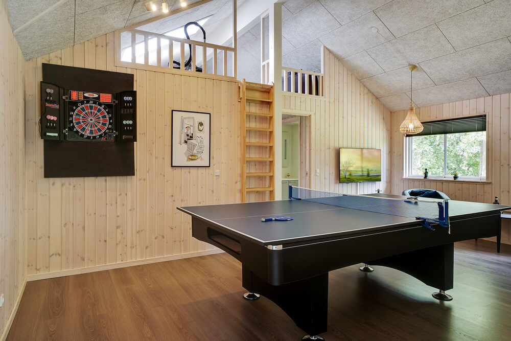 Das Luxusferienhaus 519 für 14 Personen hat einen großen Aktivitätsraum mit u. a. Billard und Darts