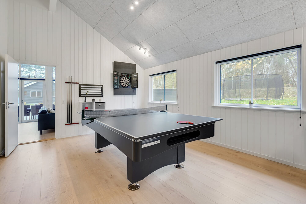 Das Luxusferienhaus 513 für 16 Personen hat einen großen Aktivitätsraum mit u. a. Billard und Darts
