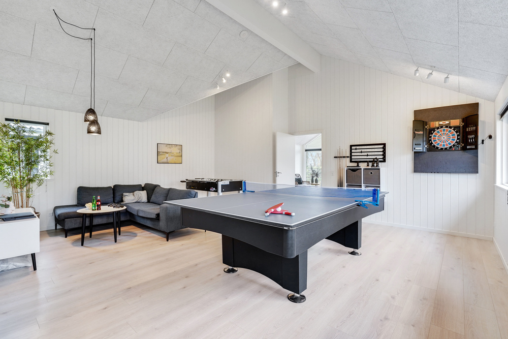 Aktivitätsraum im Luxusferienhaus Nr. 502 mit 7 Schlafzimmern und Platz für 18 Gäste.