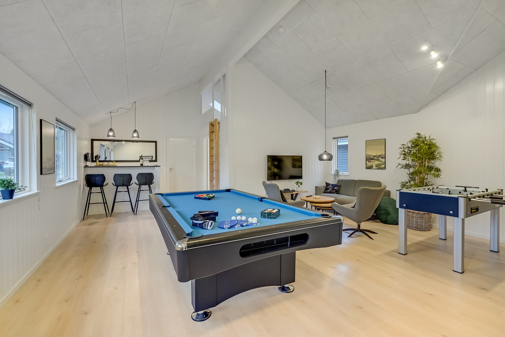 Neben den vielen schönen Stunden, die man im Poolbereich des Hauses verbringen kann, bietet das Luxusferienhaus 507 auch Spielevergnügen bei Billard/Tischtennis und Darts