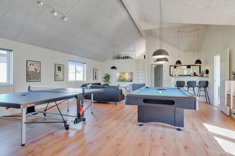 Neben den vielen schönen Stunden, die man im Poolbereich des Hauses verbringen kann, bietet das Luxusferienhaus 493 auch Spielevergnügen bei Billard/Tischtennis und Darts