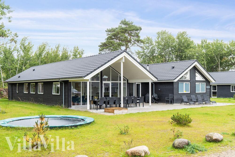 Dieses schöne Poolhaus Nr. 506 mit Platz für 18 Personen liegt in Lolland/Falster/Mön
