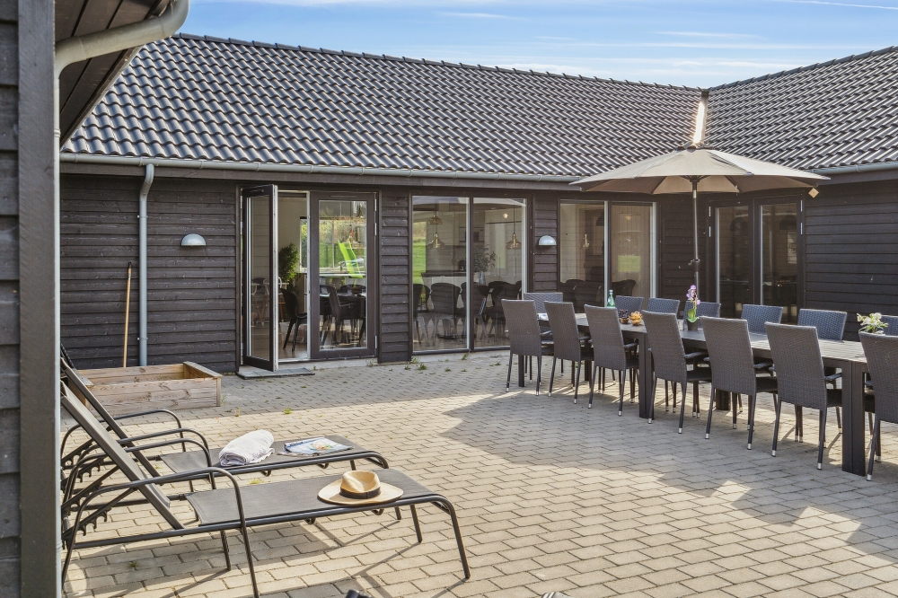 Das Luxusferienhaus Nr. 499 hat eine tolle Terrasse, die mit hochwertigen Gartenmöbeln für 24 Personen ausgestattet ist.
