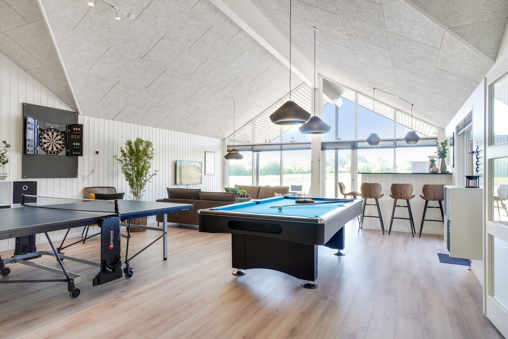 Neben den vielen schönen Stunden, die man im Poolbereich des Hauses verbringen kann, bietet das Luxusferienhaus 531 auch Spielevergnügen bei Billard/Tischtennis und Darts