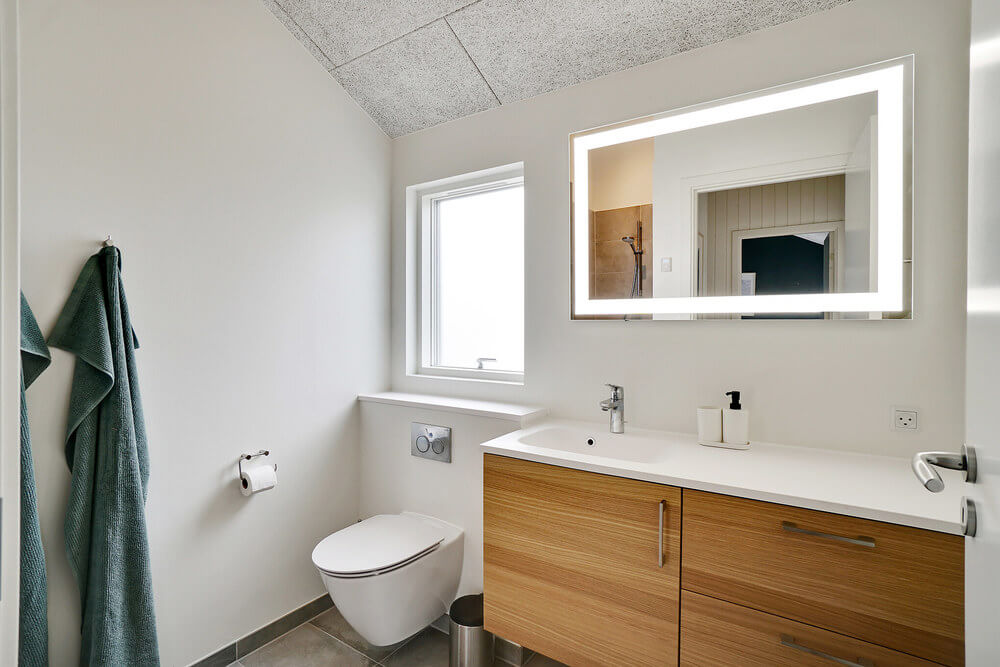 Eines der Badezimmer im Luxusferienhaus Nr. 514