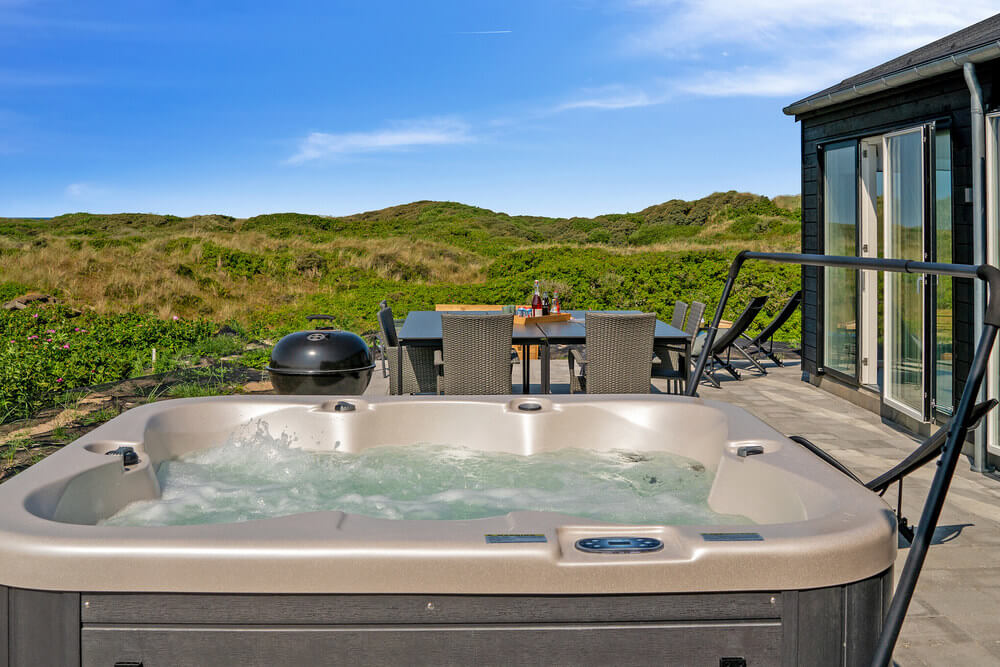 Diese schicke Haus mit Whirlpool Nr. 514 mit Platz für 10 Personen liegt in Nordjütland