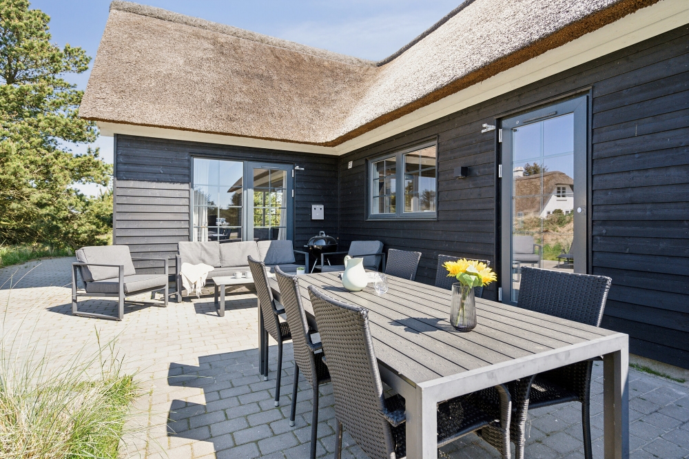 Das Luxusferienhaus Nr. 518 hat eine tolle Terrasse, die mit hochwertigen Gartenmöbeln für 14 Personen ausgestattet ist.
