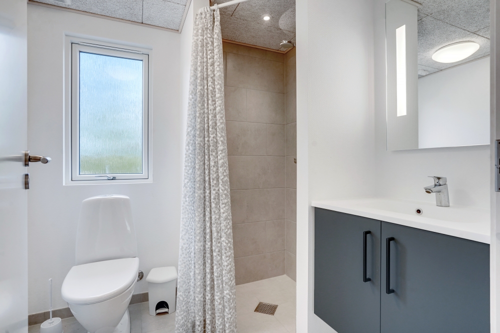 Eines der Badezimmer im Luxusferienhaus Nr. 488
