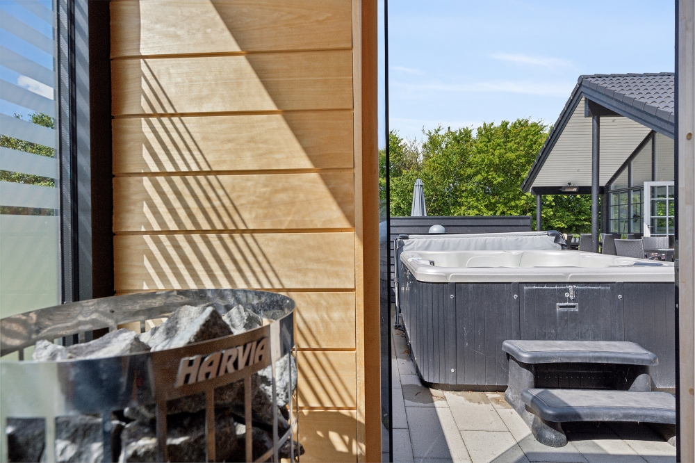 Genießen Sie die heiße Sauna im Luxusferienhaus Nr. 520 für 18 Personen