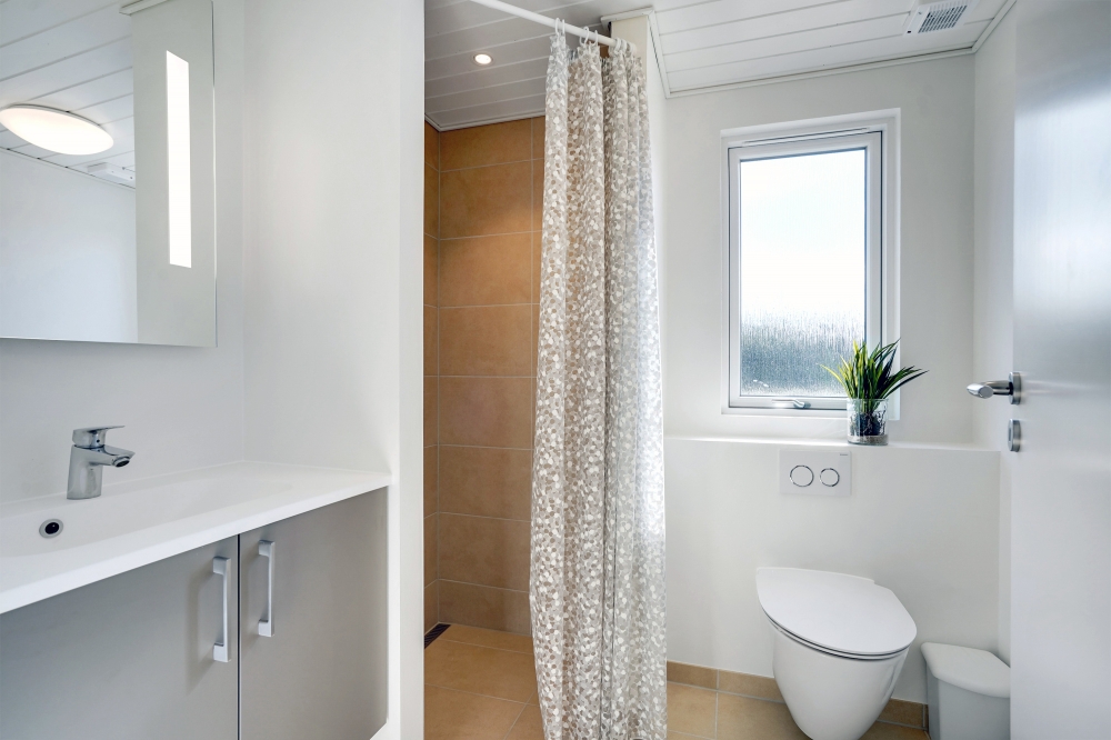Eines der Badezimmer im Luxusferienhaus Nr. 533