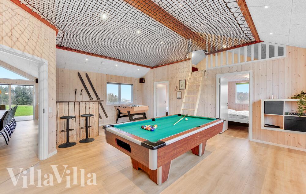 Neben den vielen schönen Stunden, die man im Poolbereich des Hauses verbringen kann, bietet das Luxusferienhaus 539 auch Spielevergnügen bei Billard/Tischtennis und Darts
